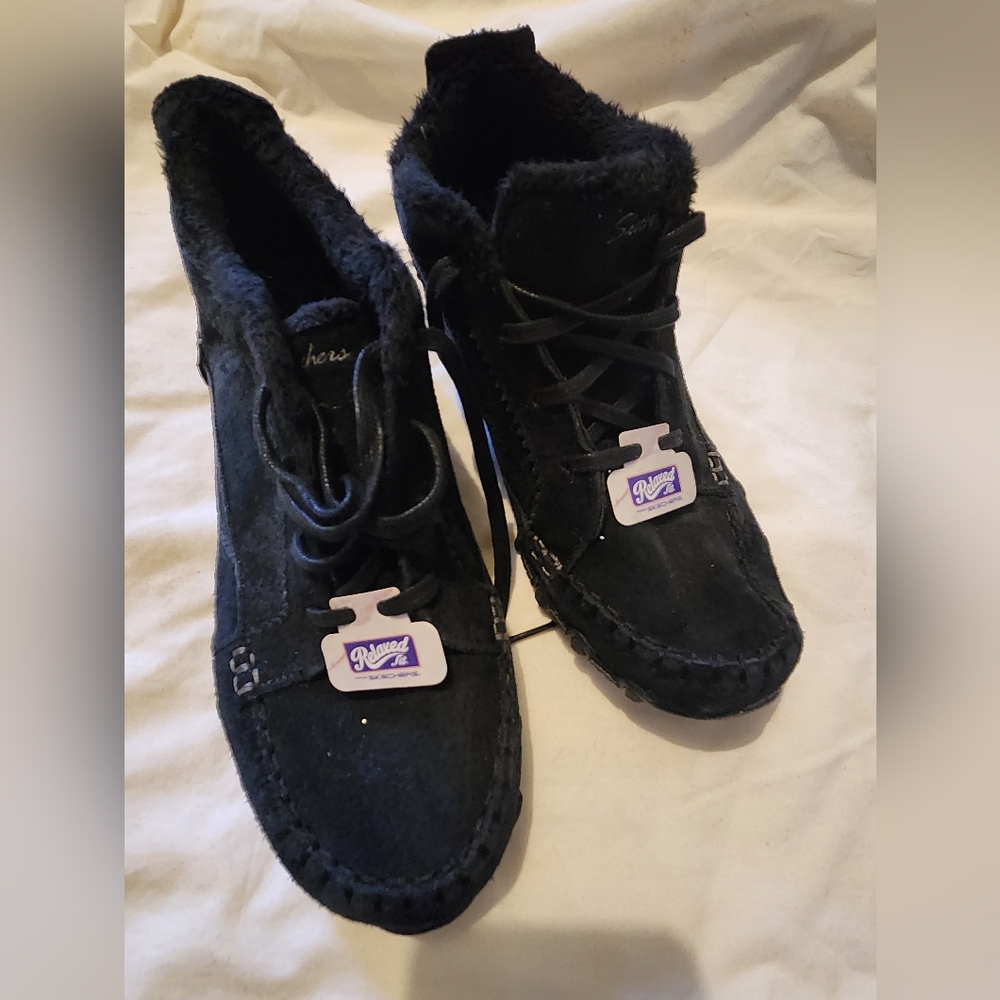 Relaxed Fit From Skechers House shoes.